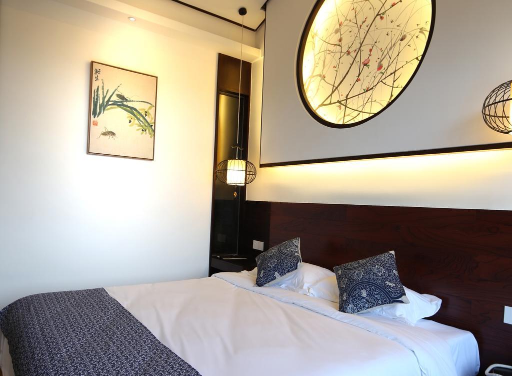 Floral Hotel - Yuexiang Inn Wuzhen Цзясин Экстерьер фото