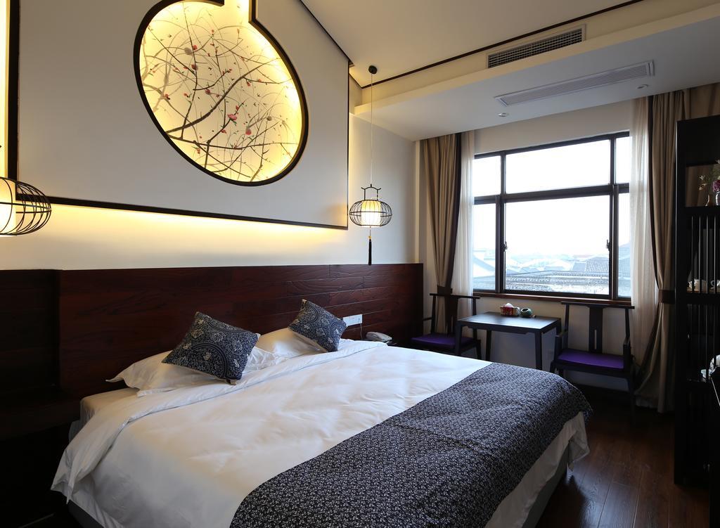 Floral Hotel - Yuexiang Inn Wuzhen Цзясин Экстерьер фото