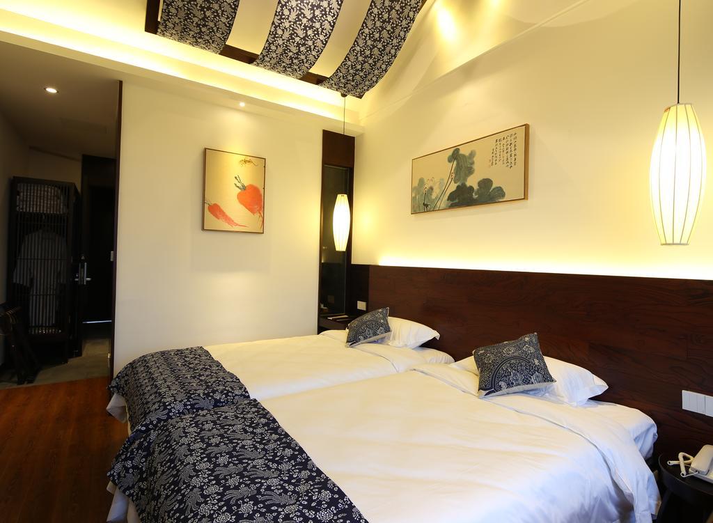 Floral Hotel - Yuexiang Inn Wuzhen Цзясин Экстерьер фото