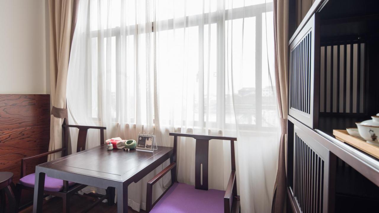 Floral Hotel - Yuexiang Inn Wuzhen Цзясин Экстерьер фото