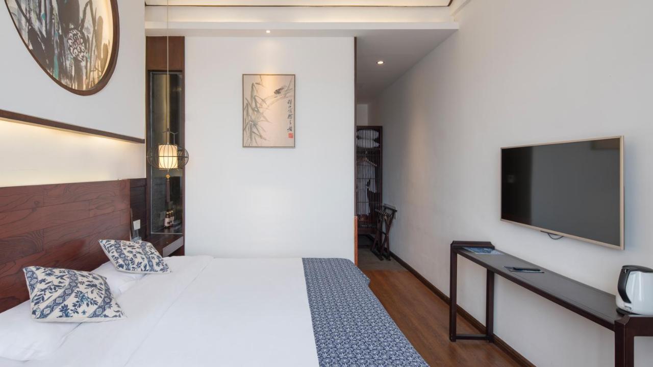 Floral Hotel - Yuexiang Inn Wuzhen Цзясин Экстерьер фото